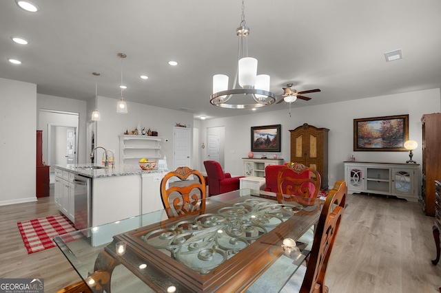 dining area with visible vents, light wood-style flooring, and recessed lighting