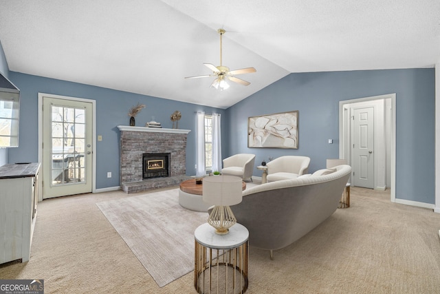 living room with a wealth of natural light, light carpet, and vaulted ceiling