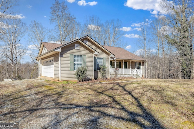 single story home featuring a porch, a front yard, roof with shingles, and an attached garage