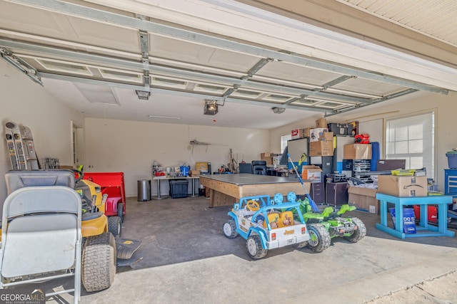 garage featuring a garage door opener