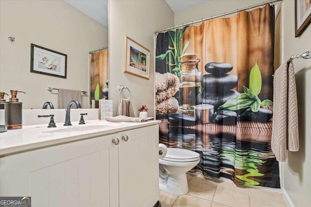 full bath with vanity, toilet, and tile patterned floors