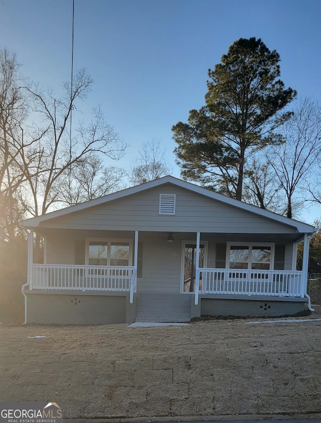 view of front of home featuring covered porch