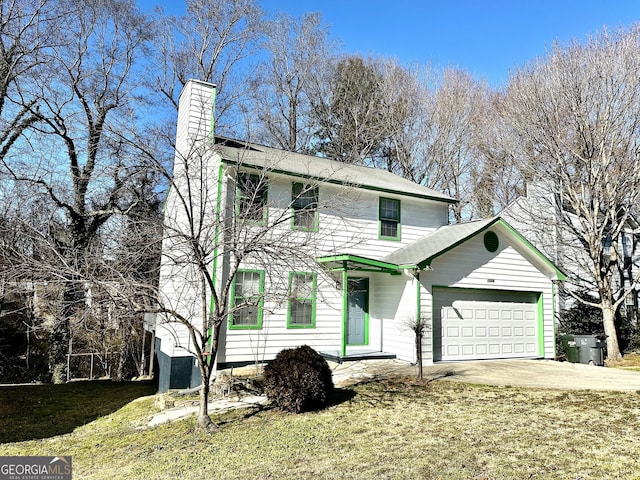 view of front of house with an attached garage, driveway, a chimney, and a front yard