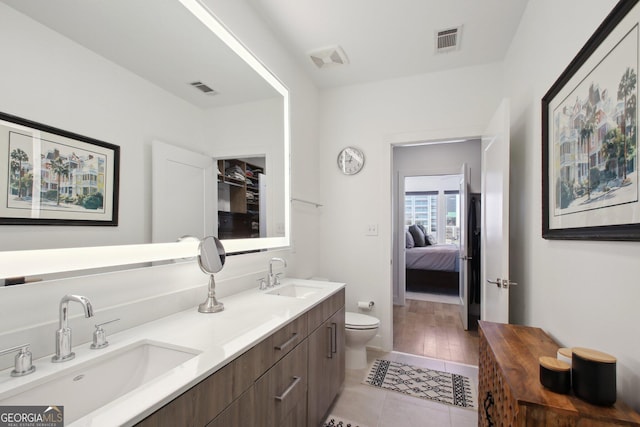 775 Juniper St NE Unit 613, Atlanta, GA 30308 - ensuite bathroom featuring double vanity and tile patterned floors