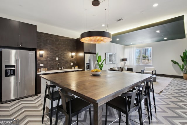775 Juniper St NE Unit 613, Atlanta, GA 30308 - dining room with recessed lighting and light carpet