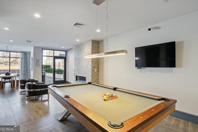775 Juniper St NE Unit 613, Atlanta, GA 30308 - playroom featuring pool table, recessed lighting, and a stone fireplace