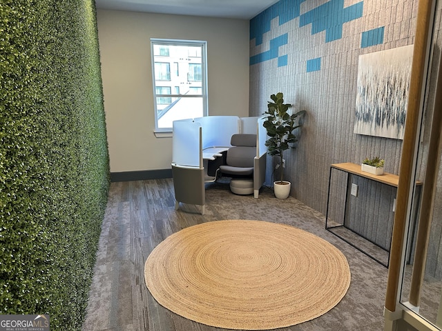 interior space featuring dark wood-style floors and baseboards