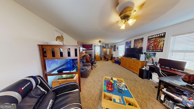 playroom featuring carpet floors and ceiling fan