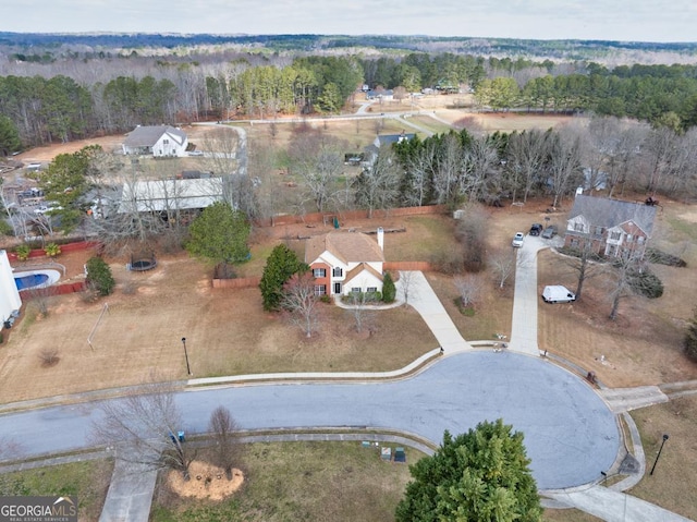 drone / aerial view with a view of trees