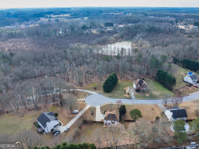 bird's eye view featuring a view of trees