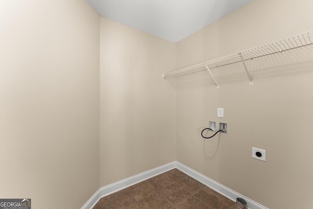 washroom with baseboards, laundry area, washer hookup, and hookup for an electric dryer