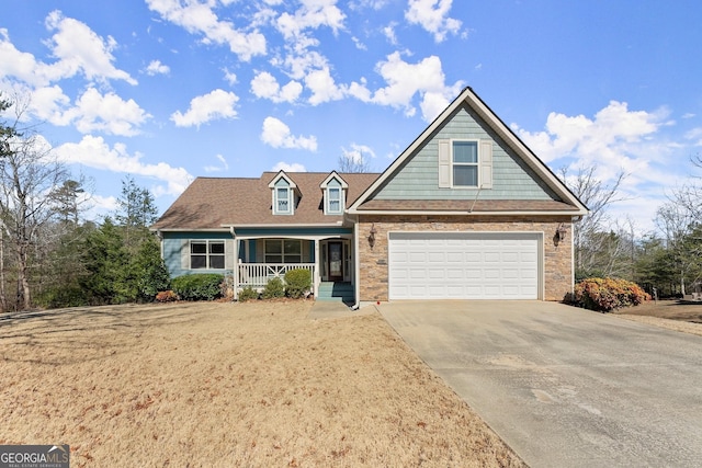 view of front of house with a porch and driveway