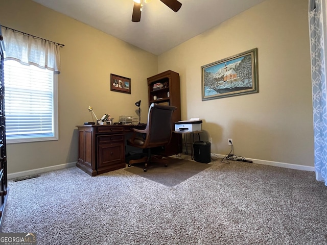 home office with carpet, baseboards, and a ceiling fan