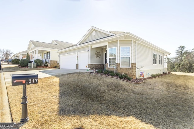 view of front of home featuring an attached garage, a front lawn, a porch, and concrete driveway