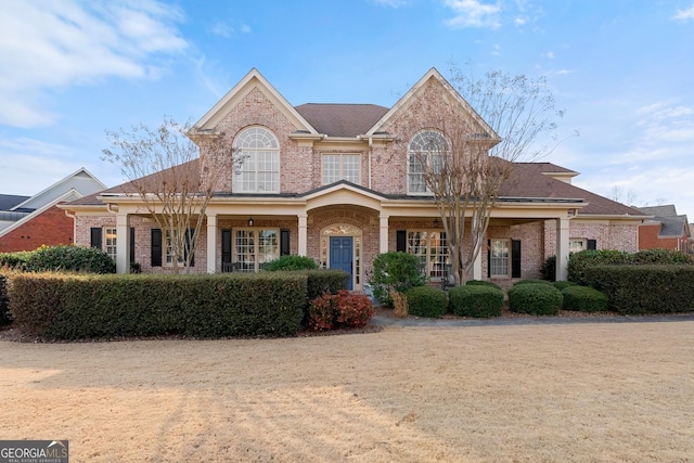 view of front facade featuring brick siding