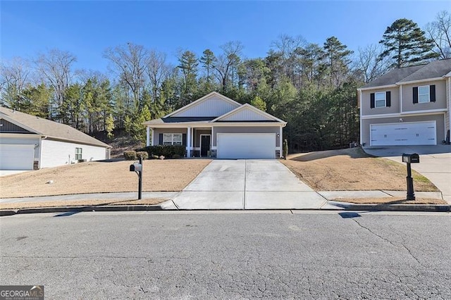 view of front of home featuring concrete driveway