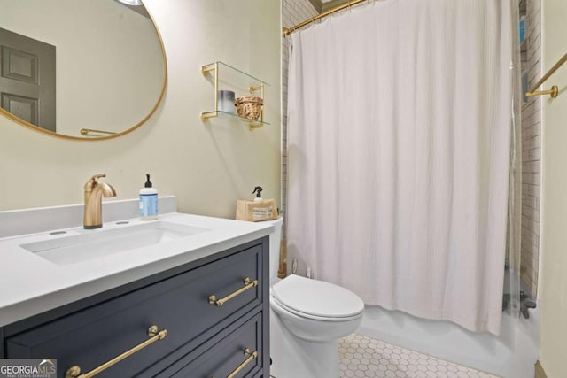 full bath featuring shower / bath combination with curtain, tile patterned flooring, vanity, and toilet