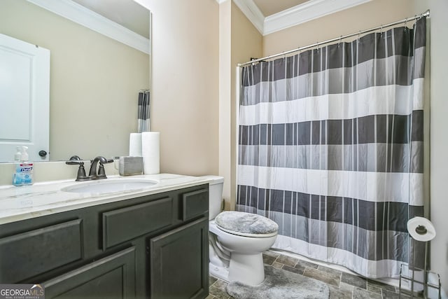 bathroom with toilet, a shower with shower curtain, vanity, stone finish floor, and crown molding