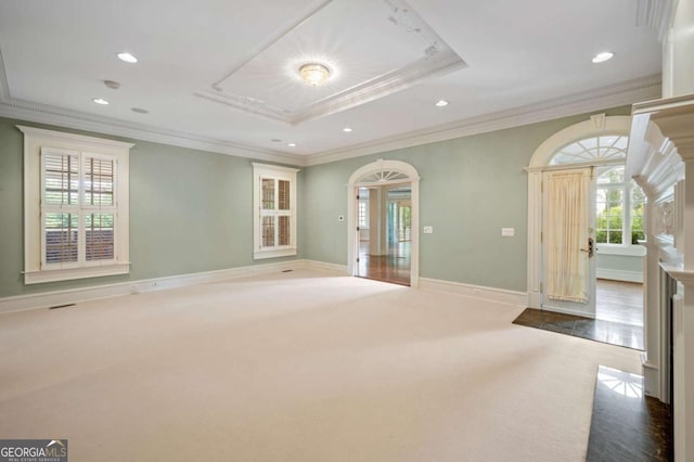 interior space with baseboards, recessed lighting, carpet flooring, and crown molding