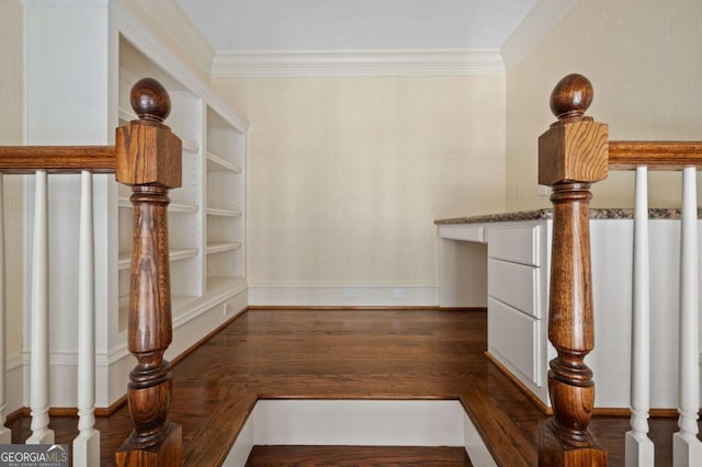 hallway with dark wood-style floors and ornamental molding