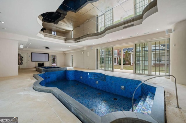 pool with a jacuzzi