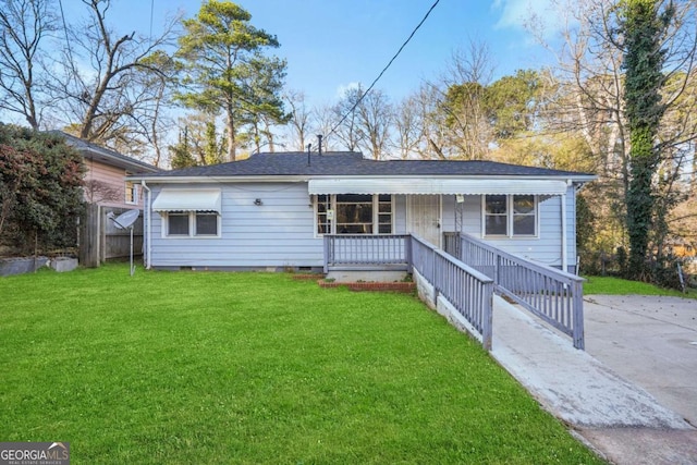 view of front of house featuring a front lawn, crawl space, a porch, and a shingled roof