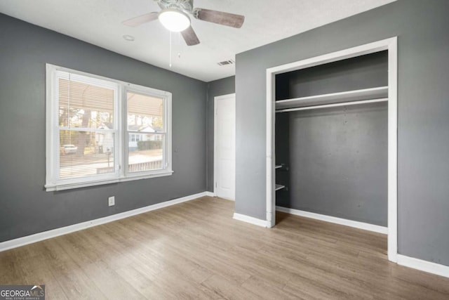 391 Mount Zion Rd SW, Atlanta, GA 30354 - unfurnished bedroom with a ceiling fan, a closet, baseboards, and light wood finished floors
