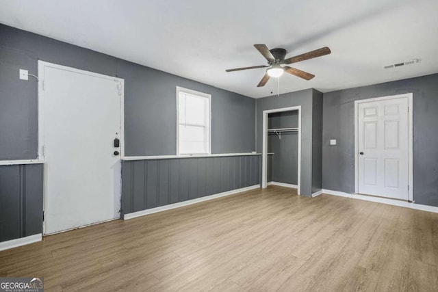 391 Mount Zion Rd SW, Atlanta, GA 30354 - unfurnished bedroom with light wood-style flooring, visible vents, baseboards, a ceiling fan, and a closet