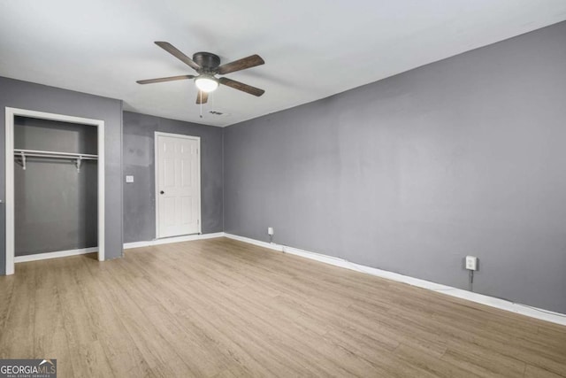 391 Mount Zion Rd SW, Atlanta, GA 30354 - unfurnished bedroom with a ceiling fan, a closet, baseboards, and light wood finished floors
