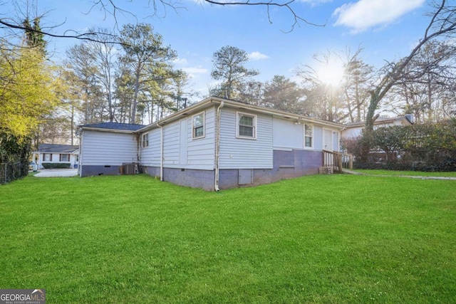 391 Mount Zion Rd SW, Atlanta, GA 30354 - view of side of home with a yard, central AC unit, and crawl space