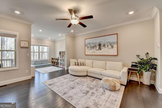 living room featuring dark wood-style floors, recessed lighting, baseboards, and crown molding