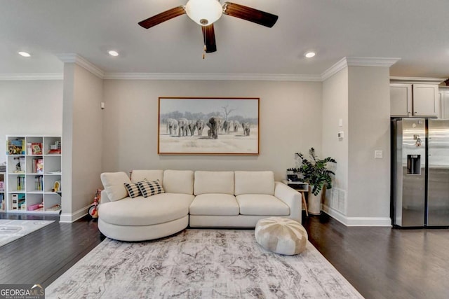 living area with ornamental molding, recessed lighting, wood finished floors, and baseboards