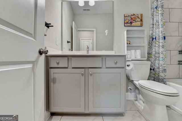 bathroom featuring toilet, visible vents, shower / bath combination with curtain, and vanity