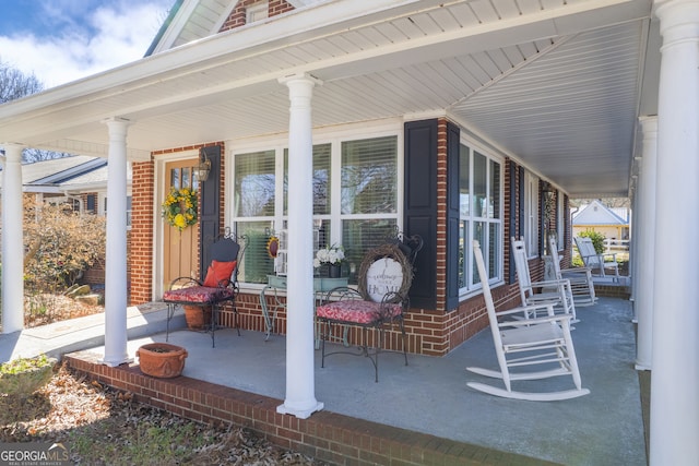 view of patio featuring a porch