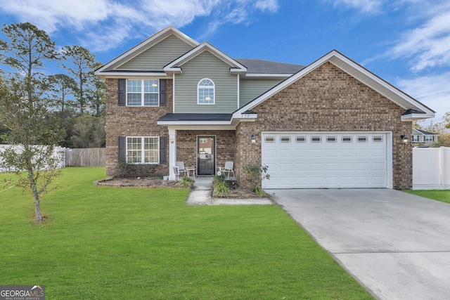 732 Waterlily Ct, Hinesville, GA 31313 - view of front of home with a front yard, a garage, driveway, brick siding, and fence