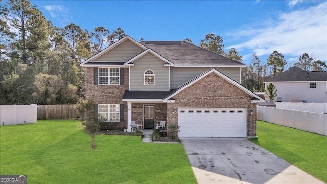 traditional-style house featuring concrete driveway, brick siding, fence, and a front lawn