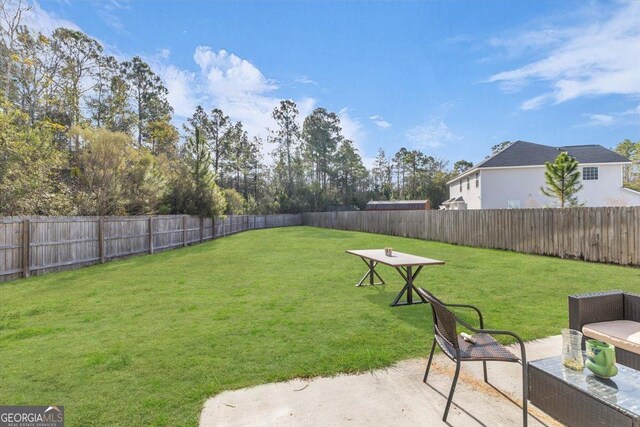 732 Waterlily Ct, Hinesville, GA 31313 - view of yard featuring a patio and a fenced backyard