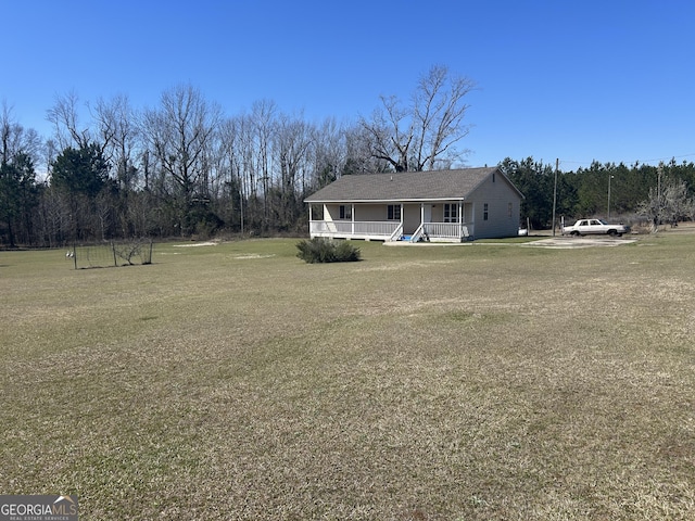 view of front of house featuring a front lawn and a porch