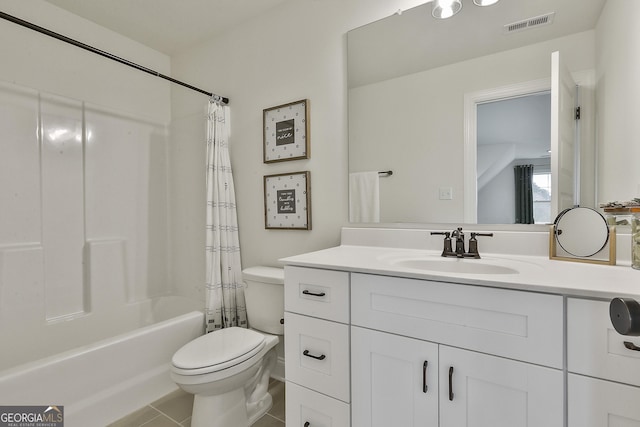 full bath featuring shower / bath combination with curtain, visible vents, toilet, vanity, and tile patterned flooring