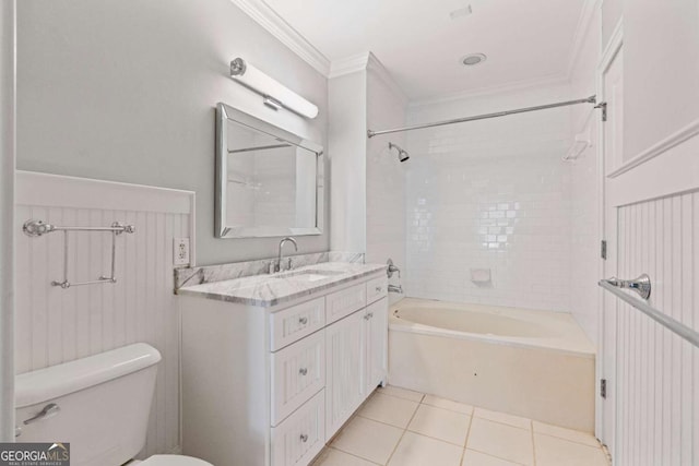 full bathroom featuring crown molding, toilet, tub / shower combination, vanity, and tile patterned floors