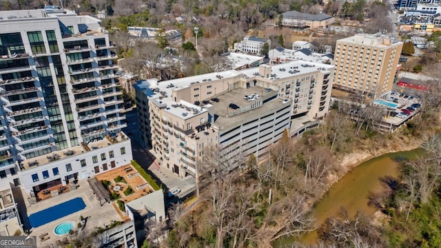 birds eye view of property with a city view