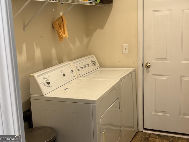 laundry room featuring laundry area and washer and clothes dryer