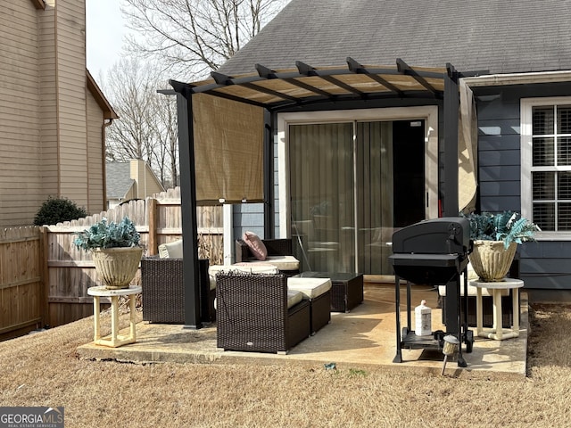 view of patio / terrace featuring fence, an outdoor living space, a pergola, and area for grilling