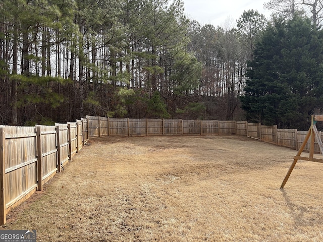 view of yard featuring a fenced backyard