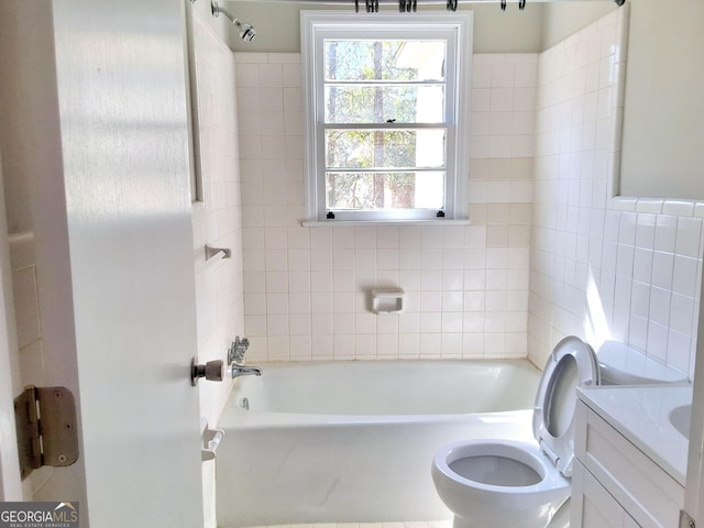 full bathroom featuring toilet, bathtub / shower combination, and vanity