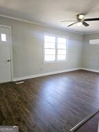 1014 Walnut St, Louisville, GA 30434 - foyer with wood finished floors and ceiling fan