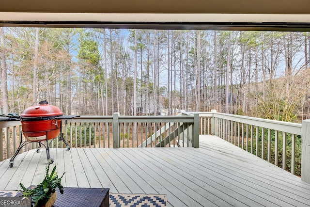 wooden deck with area for grilling