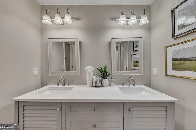 full bath featuring double vanity and a sink