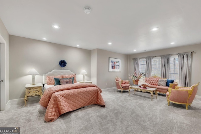 bedroom featuring recessed lighting, light carpet, and baseboards