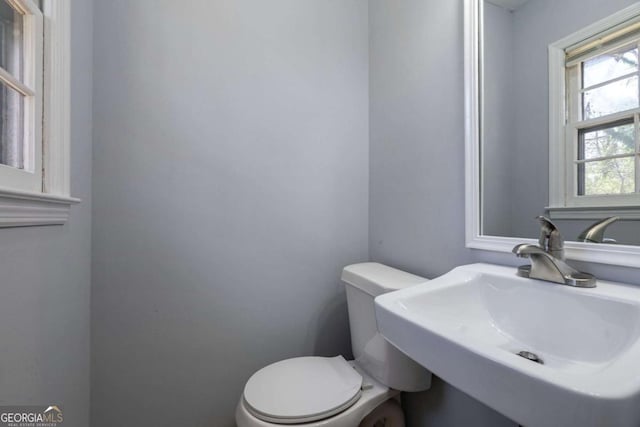 bathroom with a sink and toilet